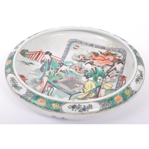 102 - An early 20th century Chinese porcelain hand painted low bowl / dish. Decorated with a group of figu... 