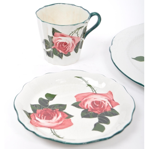 104 - Early 20th century George Stewart Bristol pottery. Rose pattern comprising of a cup, saucer, side pl... 