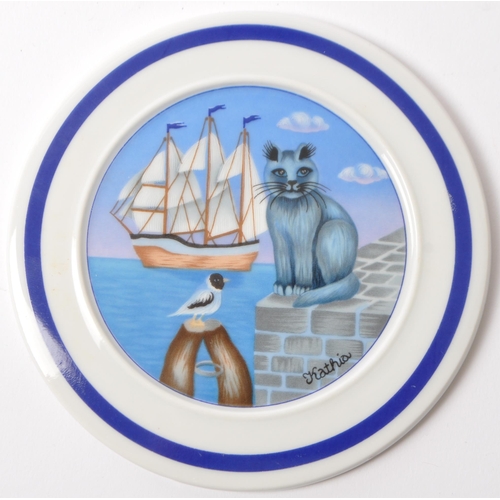 12 - Kathia's Katzen - Azberg, Germany. A collection of six ceramic pottery display dish / plates being h... 