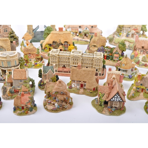 126 - A large collection of vintage 20th century unboxed 'Lilliput Lane' cottage figures to include; Tower... 