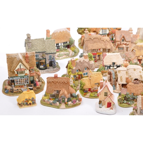 130 - A large collection of vintage 20th century unboxed 'Lilliput Lane' cottage figures to include; St La... 