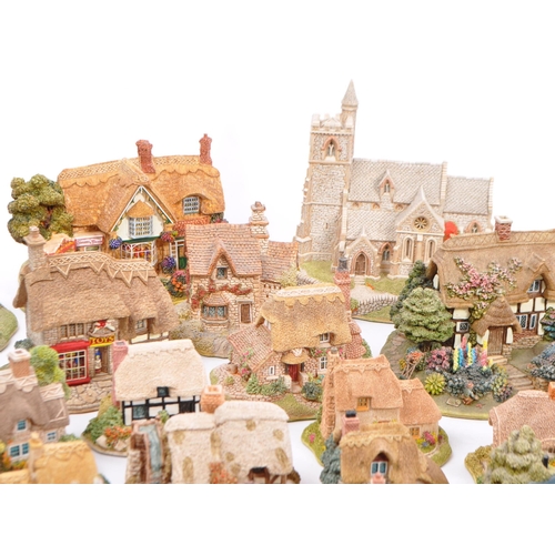 130 - A large collection of vintage 20th century unboxed 'Lilliput Lane' cottage figures to include; St La... 