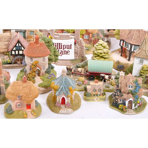 130 - A large collection of vintage 20th century unboxed 'Lilliput Lane' cottage figures to include; St La... 