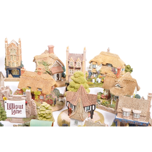 130 - A large collection of vintage 20th century unboxed 'Lilliput Lane' cottage figures to include; St La... 