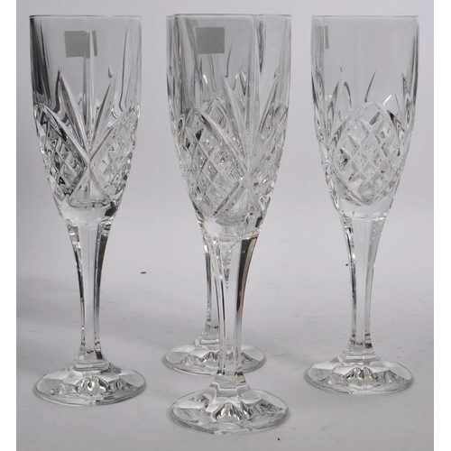 131 - Royal Doulton - Crystal Giftware - A contemporary ice bucket and champagne flute drinking glasses. A... 