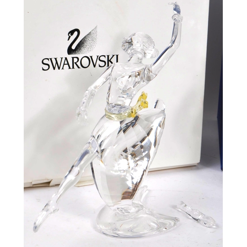 139 - Swarovski - A collection of four vintage 20th century Swarovski crystal glass ornament figures to in... 