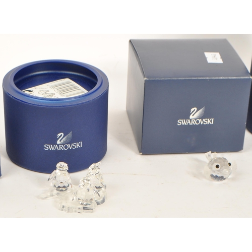 142 - Swarovski - A collection of vintage 20th century Swarovski Crystal glass boxed sea animal related fi... 