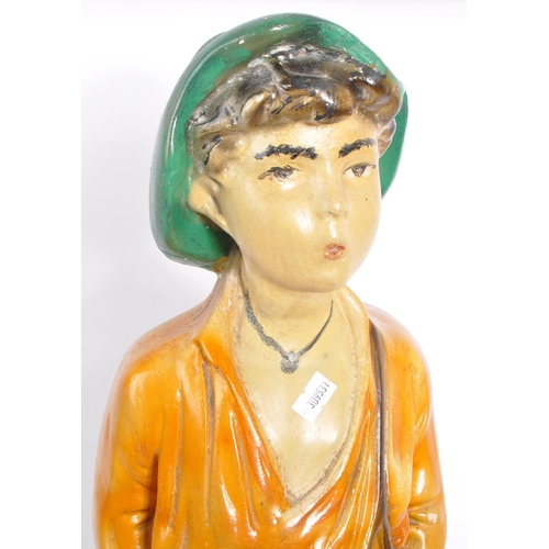 148 - Early 20th century plaster model of a child on a naturalistic plinth base. Hand painted finish. Meas... 