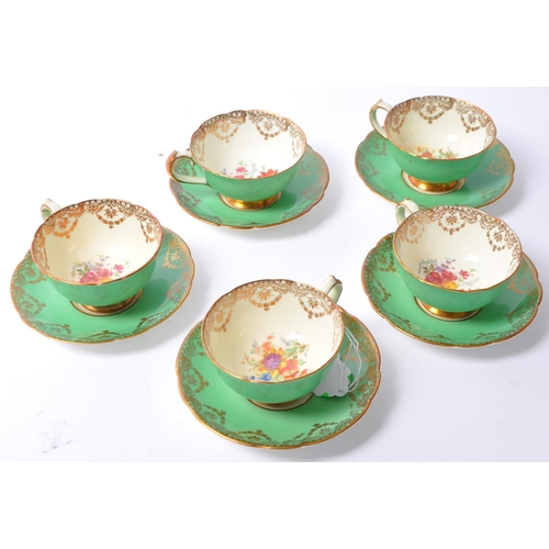 15 - Paragon - Early 20th century fine bone china porcelain tea service set. Having five cups and five sa... 