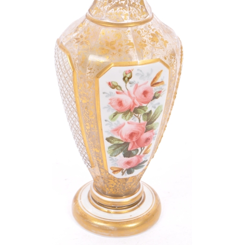 150 - A 19th century Bohemian overlay glass vase. Hand painted with scenes of floral sprays on white groun... 