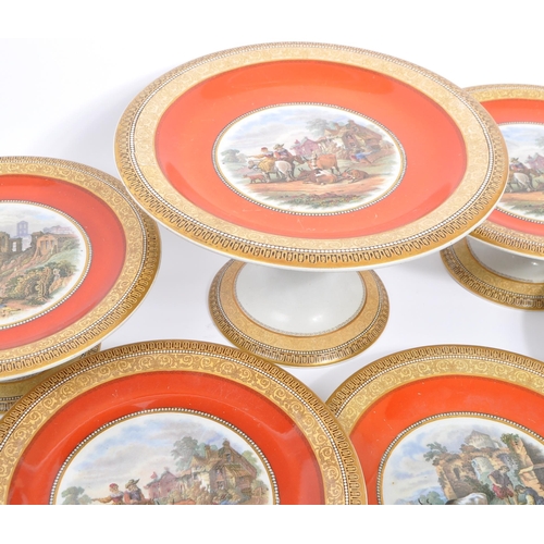 159 - An extensive collection of 19th Century English prattware plates and tazzas all having orange and gi... 