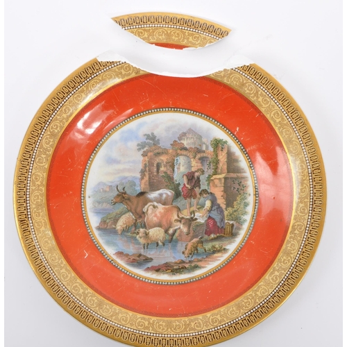 159 - An extensive collection of 19th Century English prattware plates and tazzas all having orange and gi... 