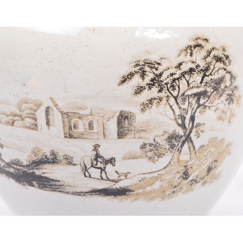 165 - An 18th Century pearlware creamer jug having transfer printed old country house scenes to the front ... 