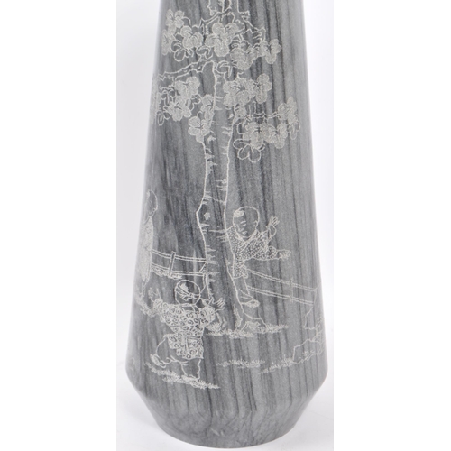 17 - A 1960's Regency Hollywood carved marble Indian vase. The vase being chase carved with scenes of chi... 