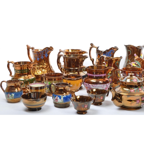 171 - A large collection of 19th century Victorian lustre ware jugs, with copper / brown design to ground.... 