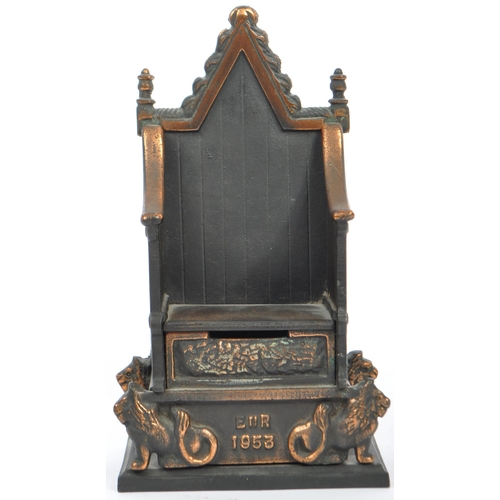 199 - A 1953 Queen Elizabeth cast iron / bronze finshed 'Throne' money box by 'Harper' Company. Front insc... 