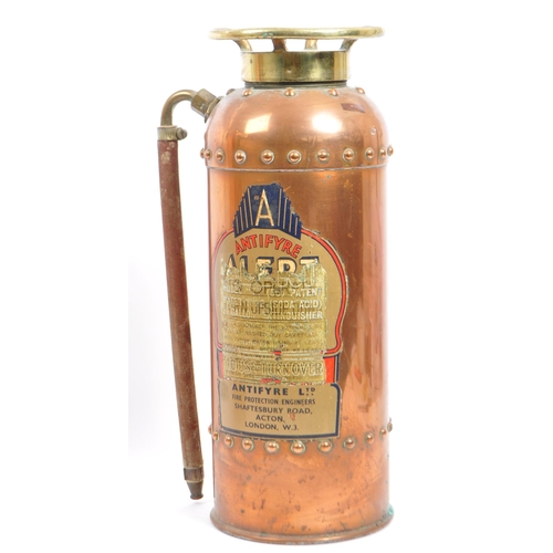 207 - Two vintage 20th century soda acid fire extinguishers in copper finish canisters. Both having origin... 