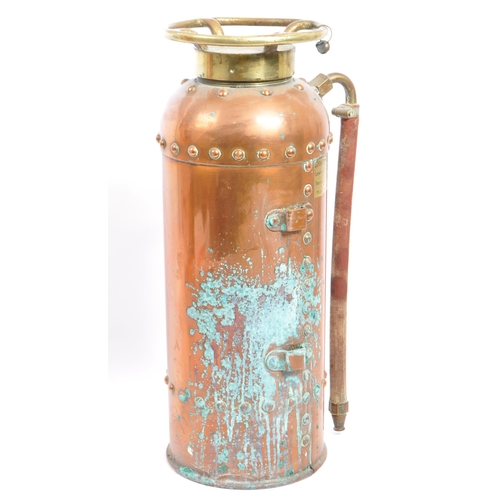 207 - Two vintage 20th century soda acid fire extinguishers in copper finish canisters. Both having origin... 