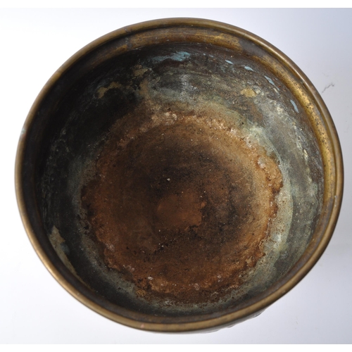 218 - A late 19th century Arts & Crafts brass cauldron pot. Having a flared lipped into a bulbous round bo... 