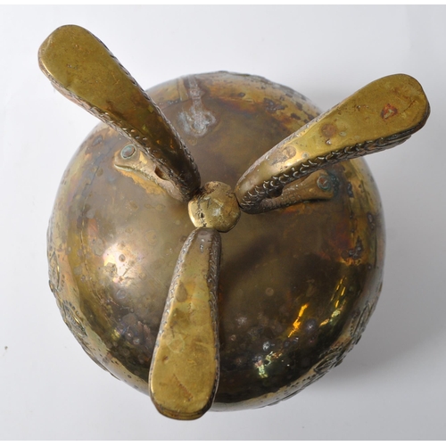 218 - A late 19th century Arts & Crafts brass cauldron pot. Having a flared lipped into a bulbous round bo... 