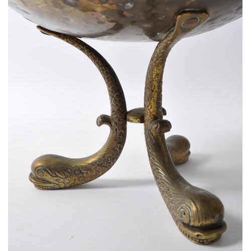 218 - A late 19th century Arts & Crafts brass cauldron pot. Having a flared lipped into a bulbous round bo... 