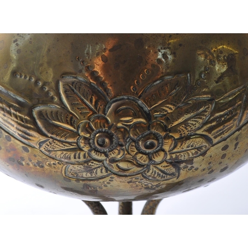 218 - A late 19th century Arts & Crafts brass cauldron pot. Having a flared lipped into a bulbous round bo... 