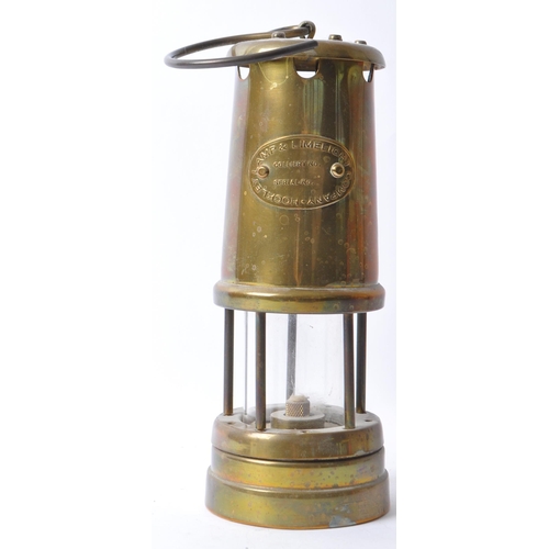 228 - A 20th century brass miners’ lamp by the Lamp & Limelight Company of Hockley. Complete with hanging ... 