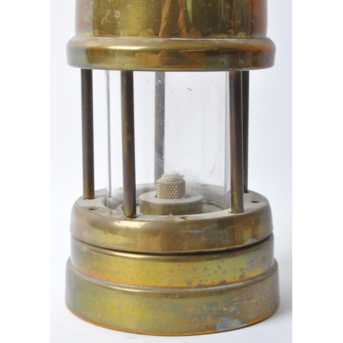 228 - A 20th century brass miners’ lamp by the Lamp & Limelight Company of Hockley. Complete with hanging ... 