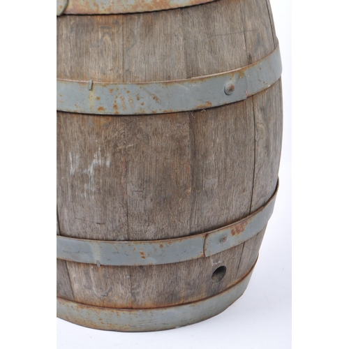 239 - A vintage mid 20th Century coopers wooden barrel with brass tap. Made from oak wood with wrought iro... 