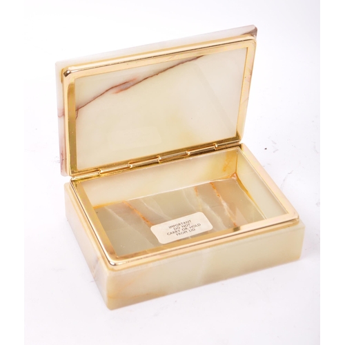 247 - A vintage 20th century Azizoff of London genuine onyx marble table top smoking set. Comprising of a ... 