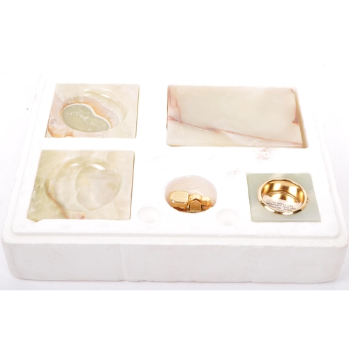 247 - A vintage 20th century Azizoff of London genuine onyx marble table top smoking set. Comprising of a ... 