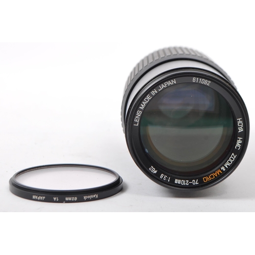 255 - A Hoya HMC zoom & macro 70-210mm 1:3.8 ⌀62, camera lens made in Japan, no. 611082. Together with a P... 