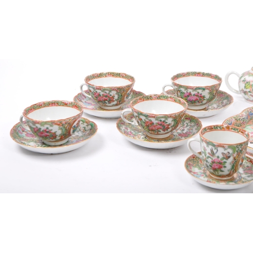 26 - An early 20th Century Chinese republic period Canton ceramic tea set. Comprising of eleven cups - ni... 