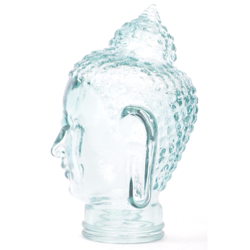 267 - A 20th century vintage pressed glass Nepalese buddha head bust with pressed features. Measures 31cm ... 