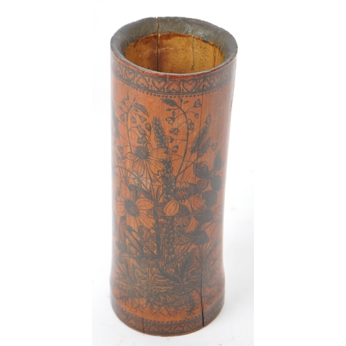 269 - A 19th century Chinese bamboo ink brush pot. The pot being decorated with hand painted florals to bo... 