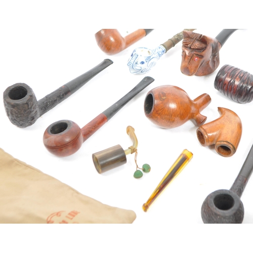 275 - A collection of vintage 20th century smoking pipes. Pipes to include examples by Duncan Dental, Echt... 