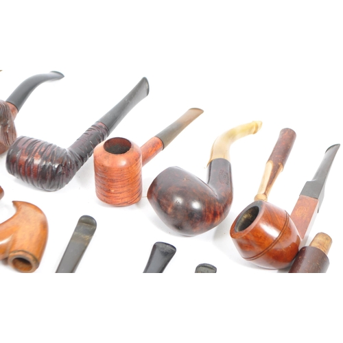 275 - A collection of vintage 20th century smoking pipes. Pipes to include examples by Duncan Dental, Echt... 