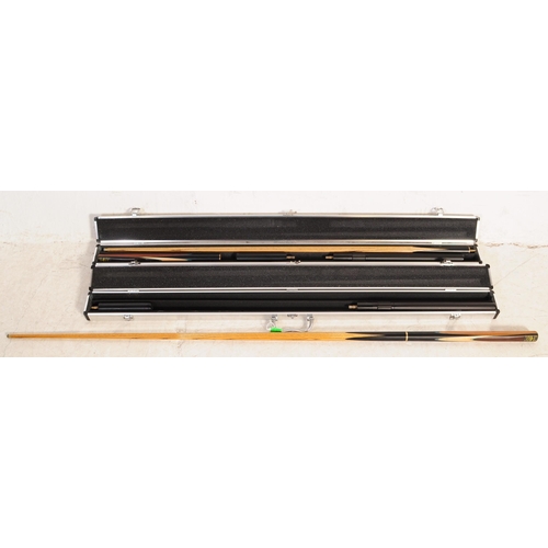 279 - A pair of contemporary / late 20th century handmade snooker / pool LP cues by Luos. Ash wood constru... 