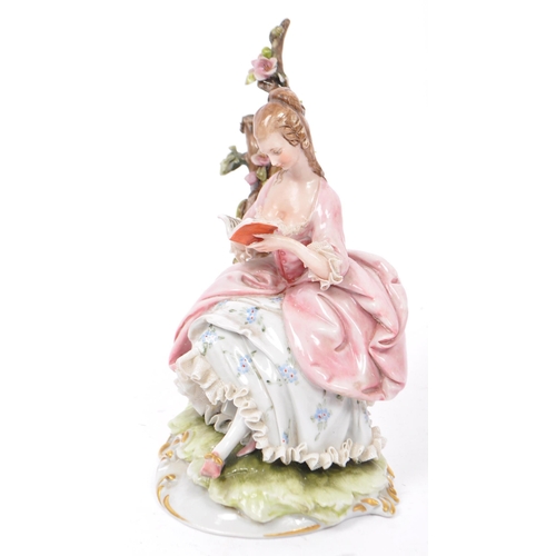 29 - Capodimonte - Italian porcelain china figures. One of a woman with a bouquet of flowers sat in a lad... 