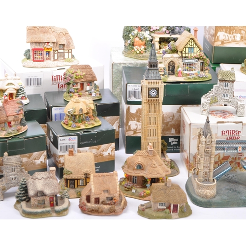 290 - Lilliput Lane - a large collection of 28 Lilliput Lane miniatures to include: Britain's Heritage L22... 