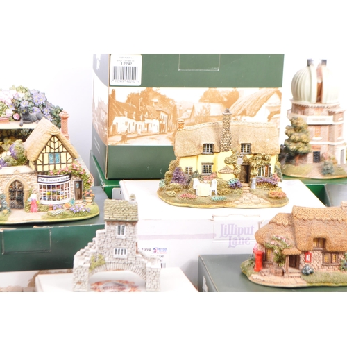 290 - Lilliput Lane - a large collection of 28 Lilliput Lane miniatures to include: Britain's Heritage L22... 