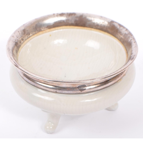 293 - A 20th century ceramic and hallmarked silver censor. The censor having a hallmarked silver collar wi... 