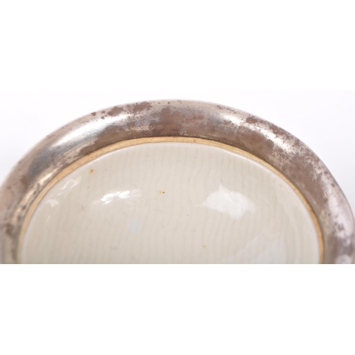 293 - A 20th century ceramic and hallmarked silver censor. The censor having a hallmarked silver collar wi... 