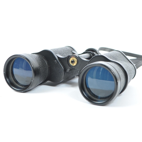 295 - Two pairs of vintage 20th century binoculars. One Ellgee cadet binoculars with 8 x 25 zoom. Together... 