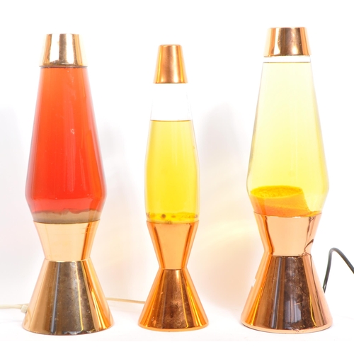 308 - Three original vintage mid 20th century lava desk table lamp lights. The lot comprising of three ele... 