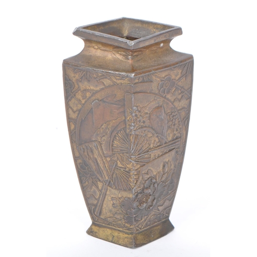 310 - A 19th Century Chinese Qing Dynasty cast bronze vase. The vase having lipped rim with diamond shaped... 