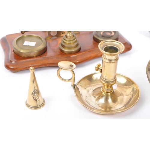 313 - A collection of early to mid 20th century brass items. Comprising of a pewter storage duck, coal sho... 