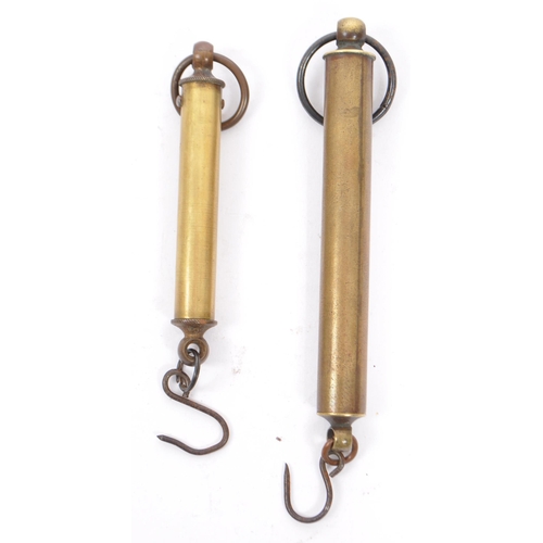 324 - A pair of early 20th Century hand held 'Troy' brass suspension scales by 'Salter'. Of cylindrical sh... 