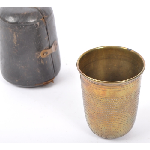 340 - An early 20th century circa 1900s WWI / campaign brass drinking portable cup. Of thimble form with l... 