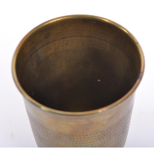 340 - An early 20th century circa 1900s WWI / campaign brass drinking portable cup. Of thimble form with l... 